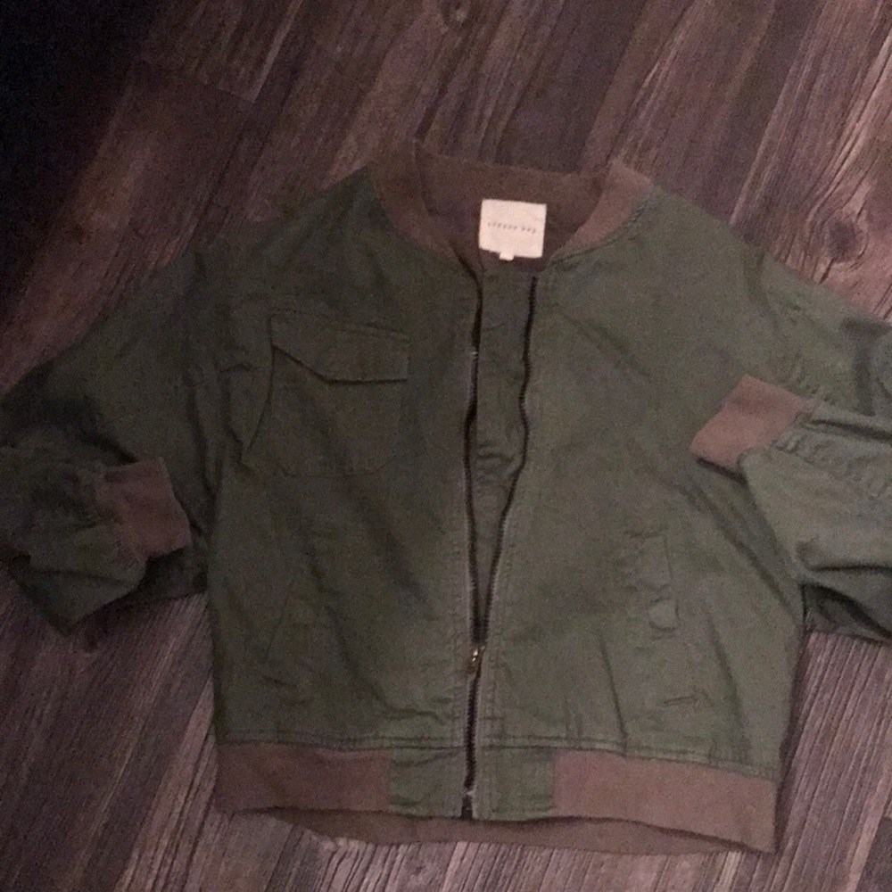 Army green bomber jacket- cropped look.